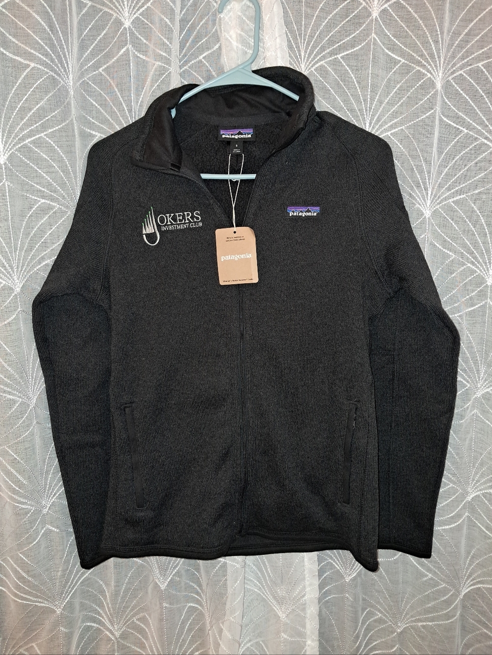 NWT Patagonia brand Women's size small full zip jacket with a company logo